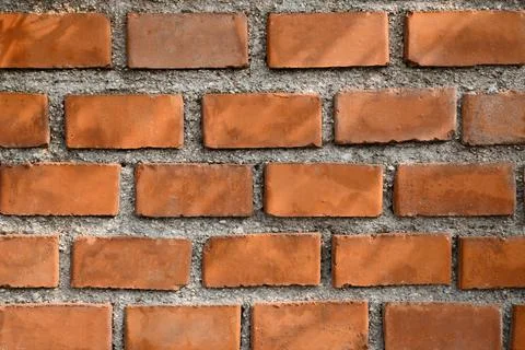 Texture of red brick wall as background, closeup view 스톡 사진