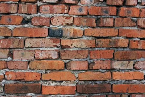 Texture of red brick wall in old abandoned building Stock Photos