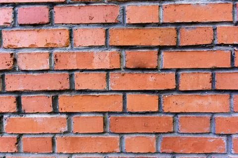 Texture of a red brick wall Stock Photos