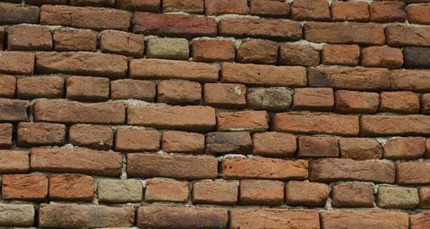 Texture with a red brick wall Stock Photos