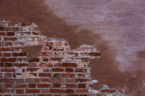 Texture of red brickwork with peeled white paint Stock Photos