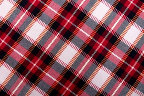 Texture of red checkered fabric. Checkered cotton background Stock Photos
