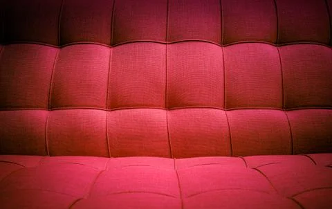 Texture of red cloth sofa. Stock Photos