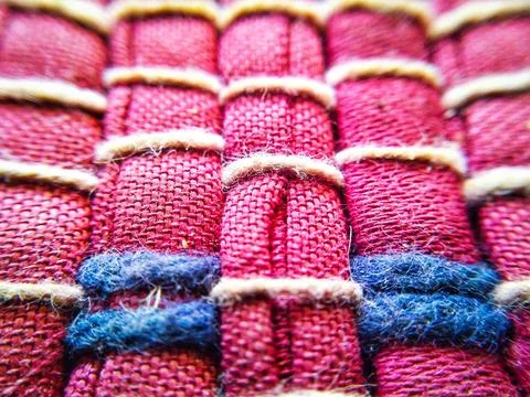 Texture of a red clothes pattern Stock Photos