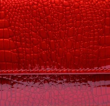 Texture of red glossy artificial leather with imitation crocodile skin and se Stock Photos