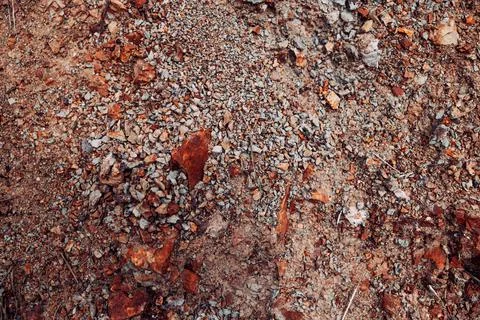 The texture of red graphium, stone, for the background Stock Photos