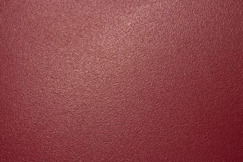 The texture of the red matte plastic.Red matte background. Stock Photos