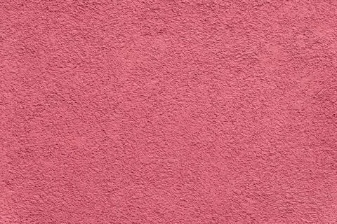 Texture of red painted and plastered building facade Stock Photos