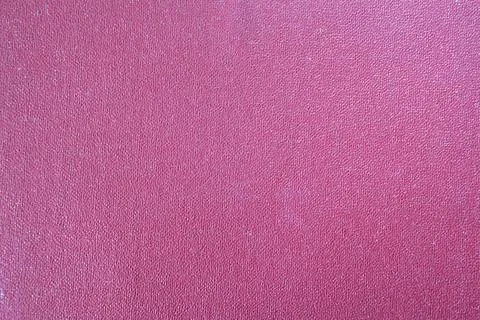 Texture of a red rough wall with uniform lighting Fotos de archivo