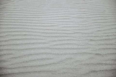 Texture of red sand with structures and small stones in black and white Stock Photos