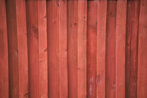 Texture with a red wall of boards Stock Photos