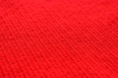 Texture of red wool knitted yarn, woolen fabric background Foto stock