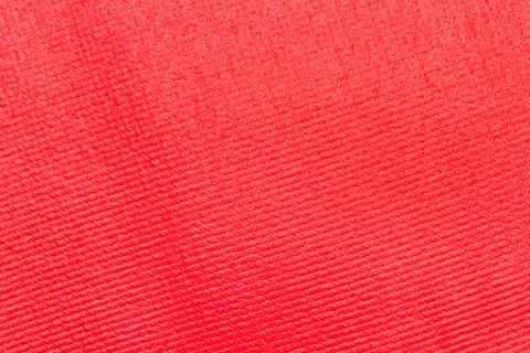 Texture of a red yoga mat in a close up view Stock Photos