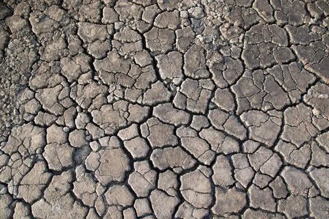 The texture of refractory clay with large cracks.drought and environmental pr Stock Photos