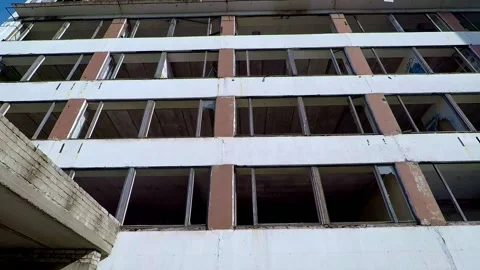 Texture, rhythmic background of rectangular windows of white and red facade of Stock Footage 130176377