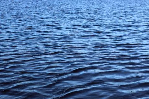Texture ripples lake Stock Photos