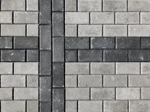 Texture of road tiles with herringbone pattern Foto stock