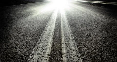 Texture of a road with two white stripes in the center Stock Photos