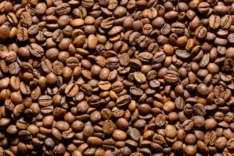 Texture of roasted coffee beans close-up Stock Photos