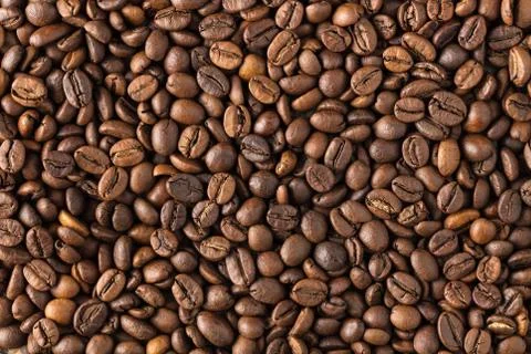 Texture of roasted coffee in beans Stock Photos