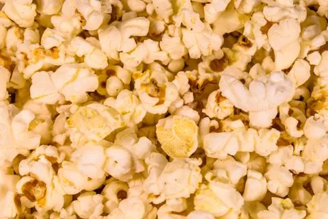 Texture of the roasted popcorn for the background Stock Photos