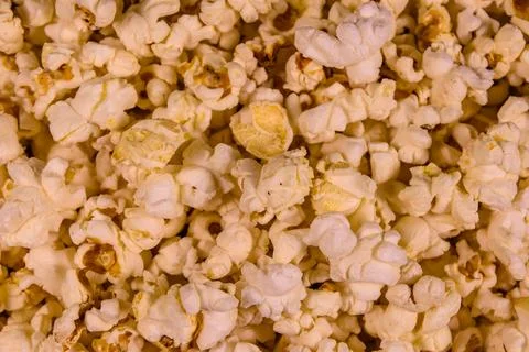 Texture of the roasted popcorn for the background Stock Photos