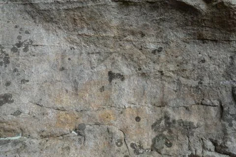 The texture of the rock with cracks. Stock Photos