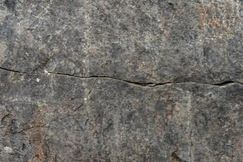 The texture of the rock with cracks. Fotos Stock
