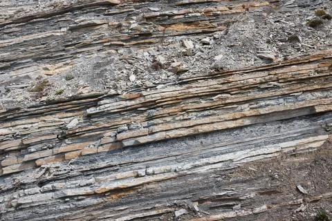 Texture of rock with different rocks, several layers of rock, close-up Fotos de archivo