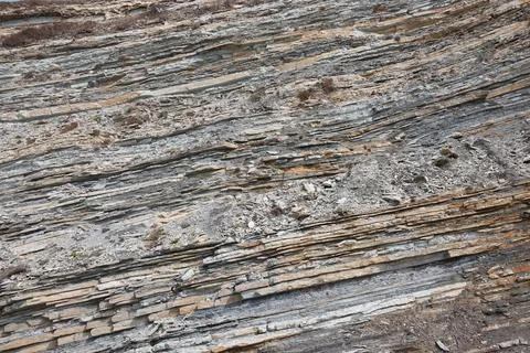 Texture of rock with different rocks, several layers of rock, close-up Fotos de archivo