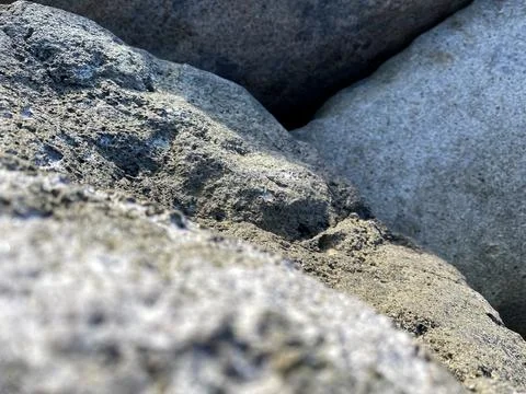 The texture of the rocks, selective focus, macro, stone background Stock Photos