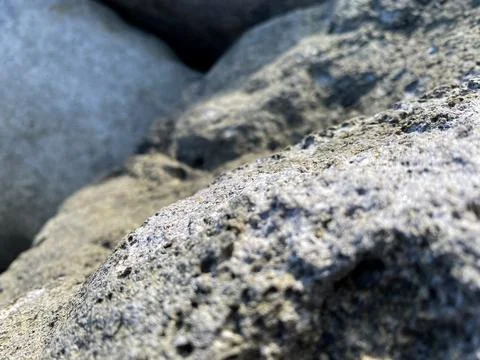 The texture of the rocks, selective focus, macro, stone background Stock Photos