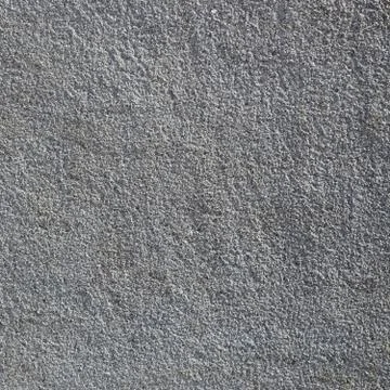 Texture of rough concrete wall with embossed texture Stock Photos
