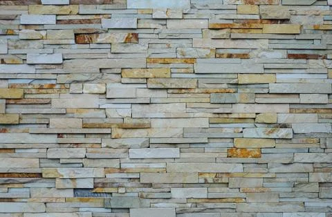 Texture of rough flat stones wall Stock Photos