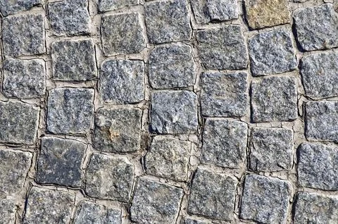 The texture of rough gray granite square tiles Stock Photos