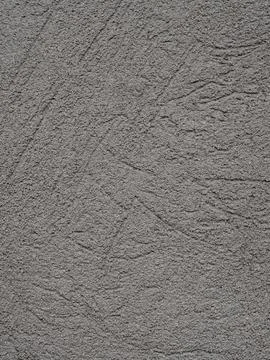 Texture of rough gray stucco surface Stock Photos