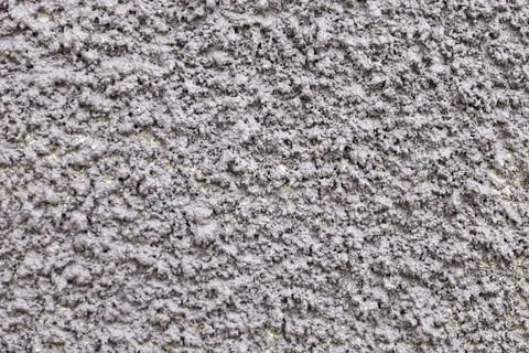 Texture of rough gray surface with intricate patterns reflecting light and .. Fotos de archivo