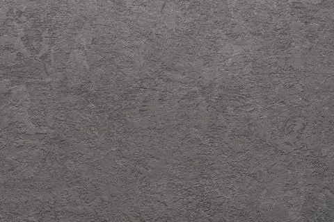 Texture of rough plastered gray wall with scratches. Сoarse сement wall. Stock Photos