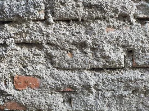 The texture of the rough wall behind the house Stock Photos