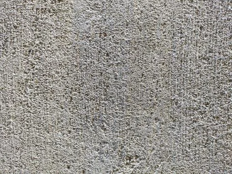 The texture of the rough wall behind the house Stock Photos