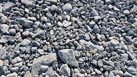 Texture of Rounded River Stones Stock Footage 248019823
