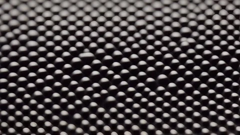 Texture of rubber mat A topdown view of a grey rubber mat with uniform raised Video stock 253605773