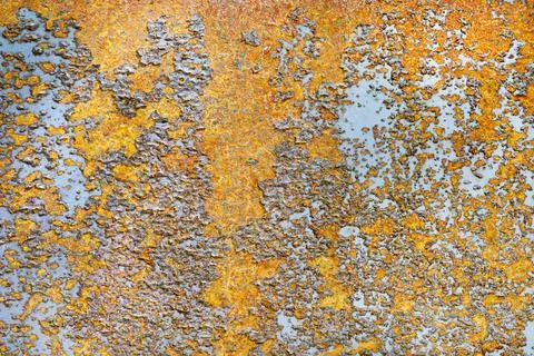 The texture rust, a background  yellow brown rust on metal Stock Photos