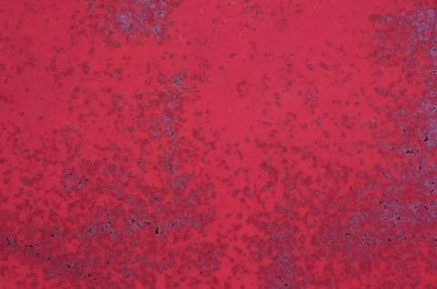 Texture of a rusted painted sheet of iron of red color Stock Photos