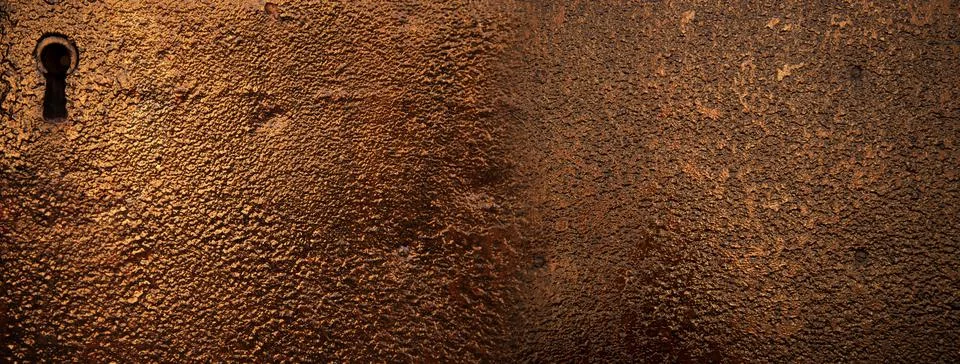 Texture of rustic metal wall with key hole banner background Stock Photos
