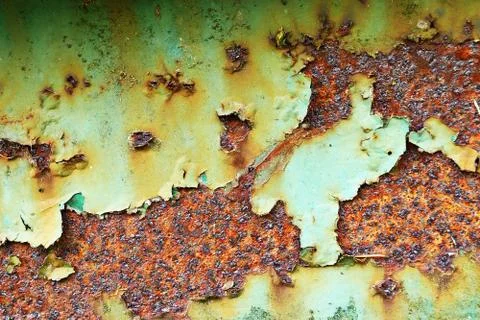 Texture of rusty green painted old metal plate Stock Photos