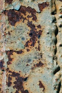 Texture of rusty iron, cracked paint on an old metallic surface, sheet of rus Stock Photos