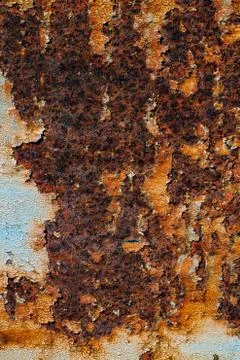 Texture of rusty iron, cracked paint on an old metallic surface, sheet of rus Stock Photos
