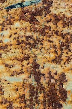Texture of rusty iron, cracked paint on an old metallic surface, sheet of rus Stock Photos