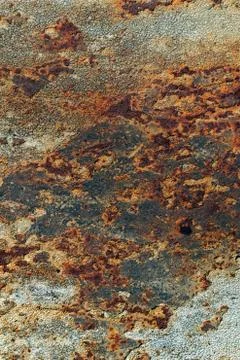 Texture of rusty iron, cracked paint on an old metallic surface, sheet of rus Stock Photos